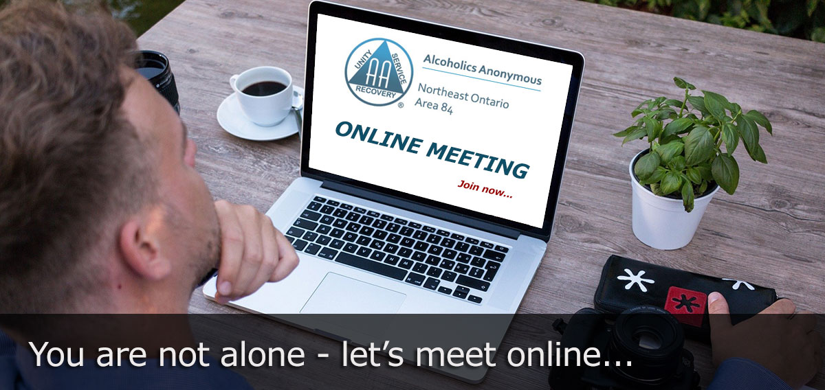 Image of man in front of computer: Invitation to online AA meeting