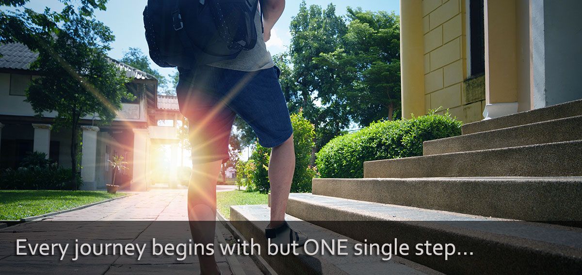 image of a person with one foot on the bottom of a set of steps